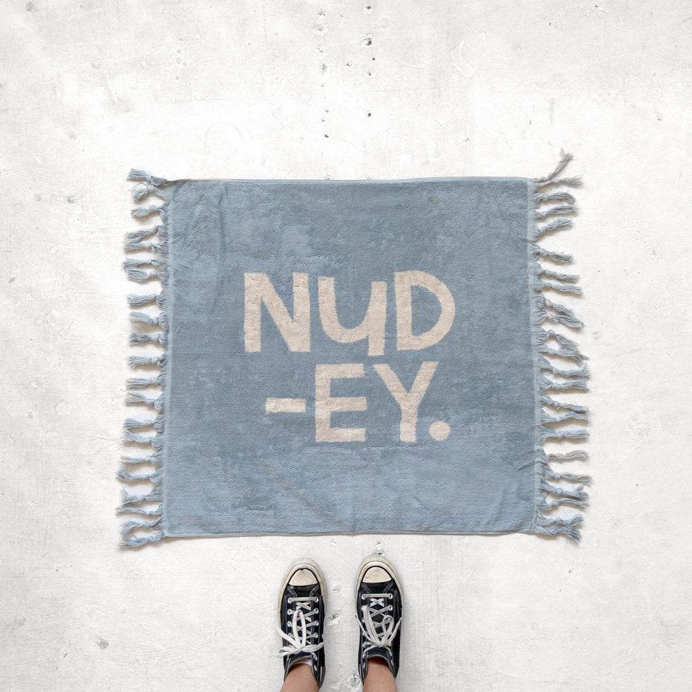 137. NUDEY BATH MAT