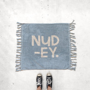 137. NUDEY BATH MAT